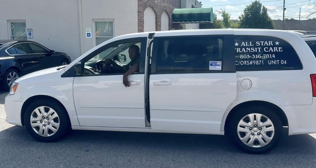 All Star Transit care van is a white van with their logo on the rear window.