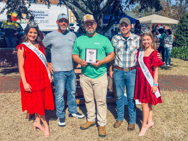 The event was a chili cook-off, where contestants competed to make the best chili. During the event, Miss Camden Teen and the queen were present, perhaps as special guests or participants. Someone took a picture of a man receiving an award, possibly for winning the chili cook-off or for another achievement related to the event.