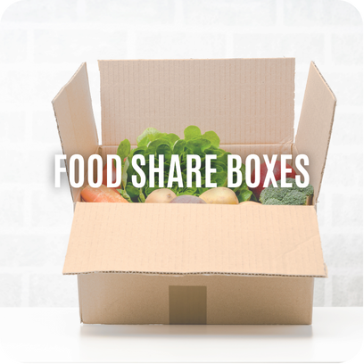 Open cardboard box filled with fresh vegetables, labeled Food Share Boxes in bold white text.
