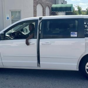 All Star Transit care van is a white van with their logo on the rear window.